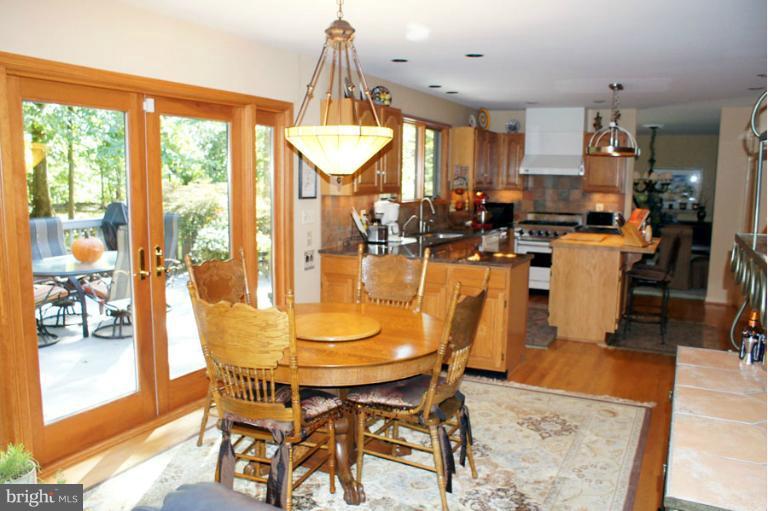 2265 Mt Tabor Road Gambrills, MD 21054 - Photo 6 of 30 Casual Dining Area Spilling onto Deck