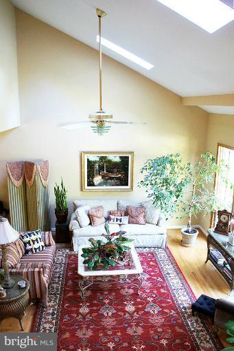 2265 Mt Tabor Road Gambrills, MD 21054 - Photo 7 of 30 Vaulted 2- Story Living Room with Skylights