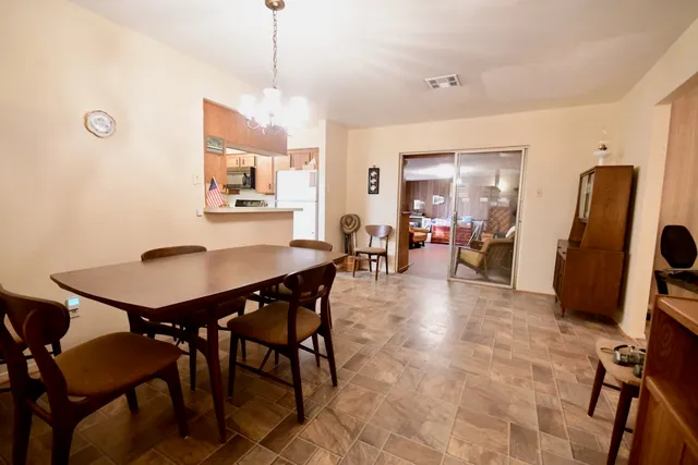 a view of a dining room with furniture