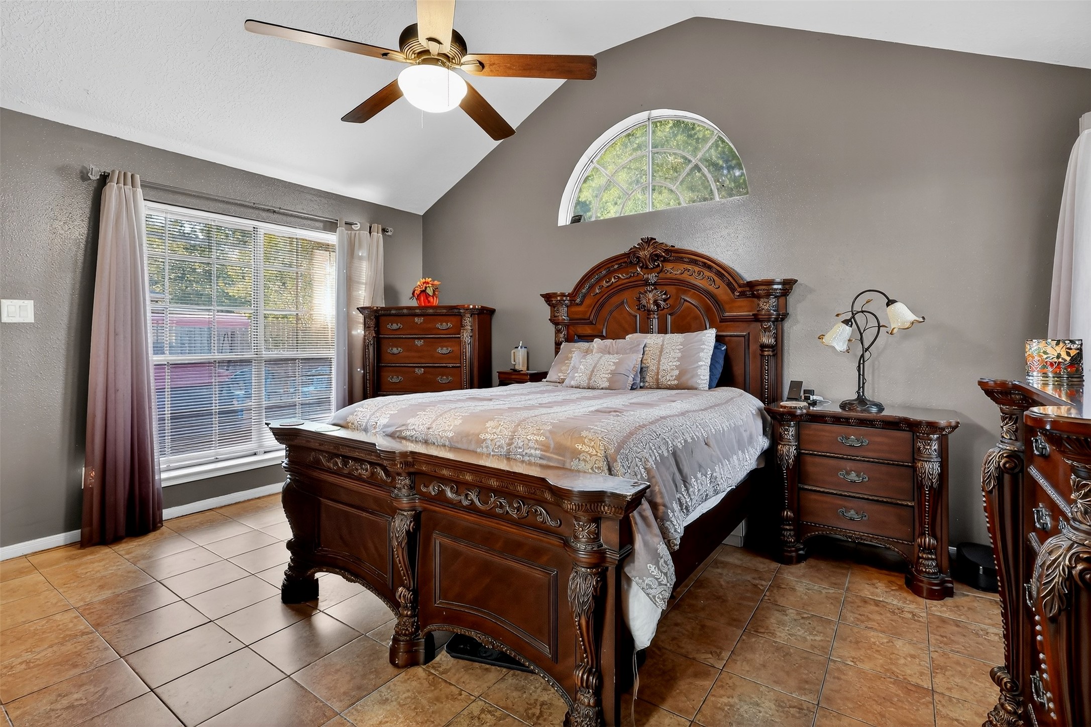 3402 Crystal Dove Drive Spring, TX 77388 - Photo 15 of 33 a bedroom with a bed and a chandelier