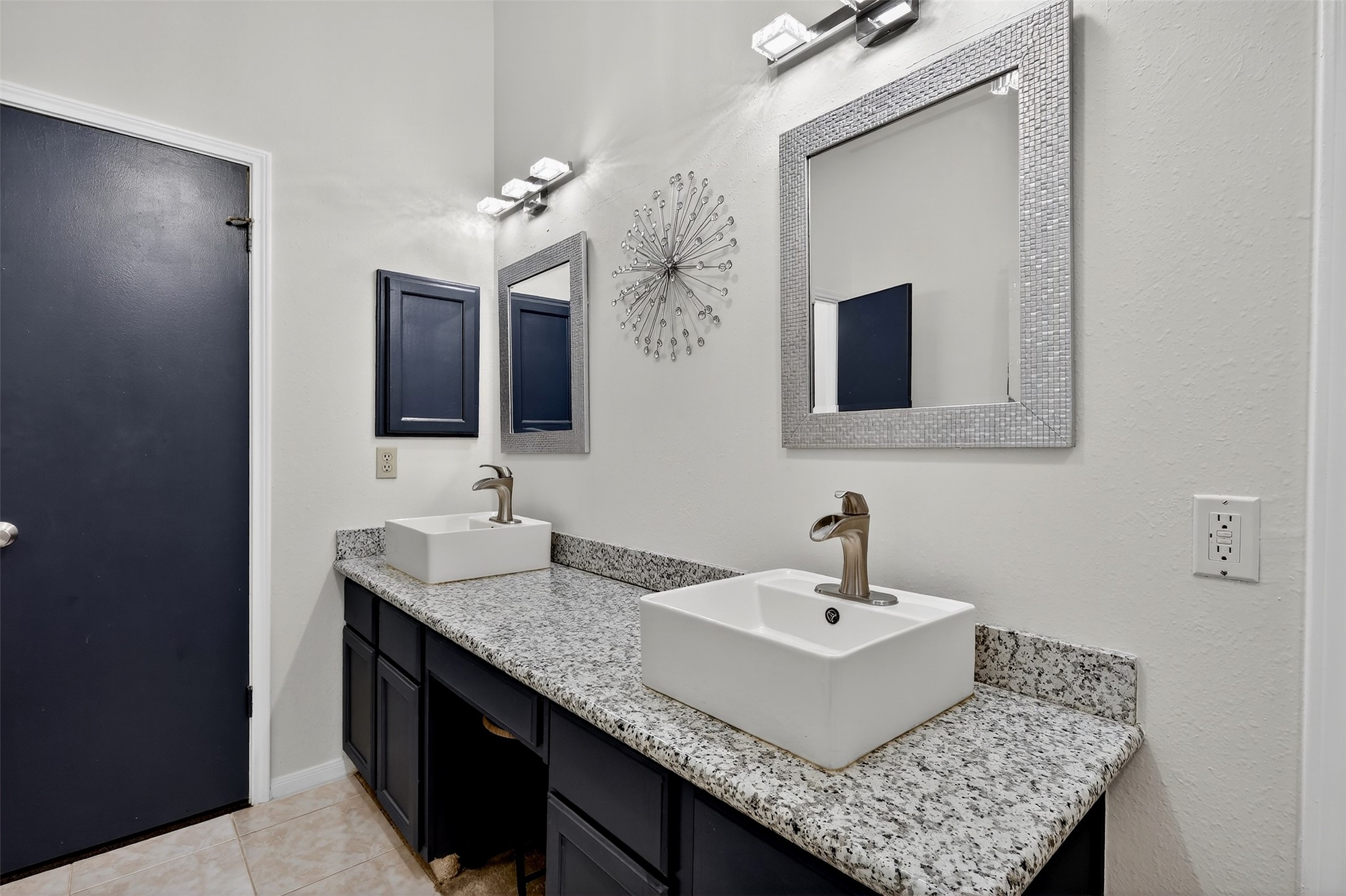 3402 Crystal Dove Drive Spring, TX 77388 - Photo 17 of 33 a bathroom with a sink double vanity and a mirror