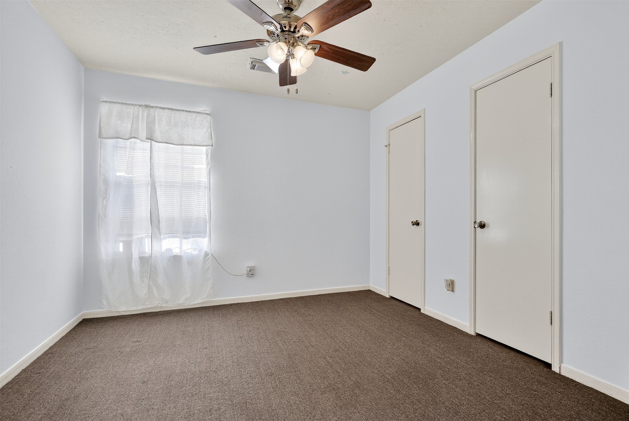 3402 Crystal Dove Drive Spring, TX 77388 - Photo 21 of 33 a view of an empty room with a window