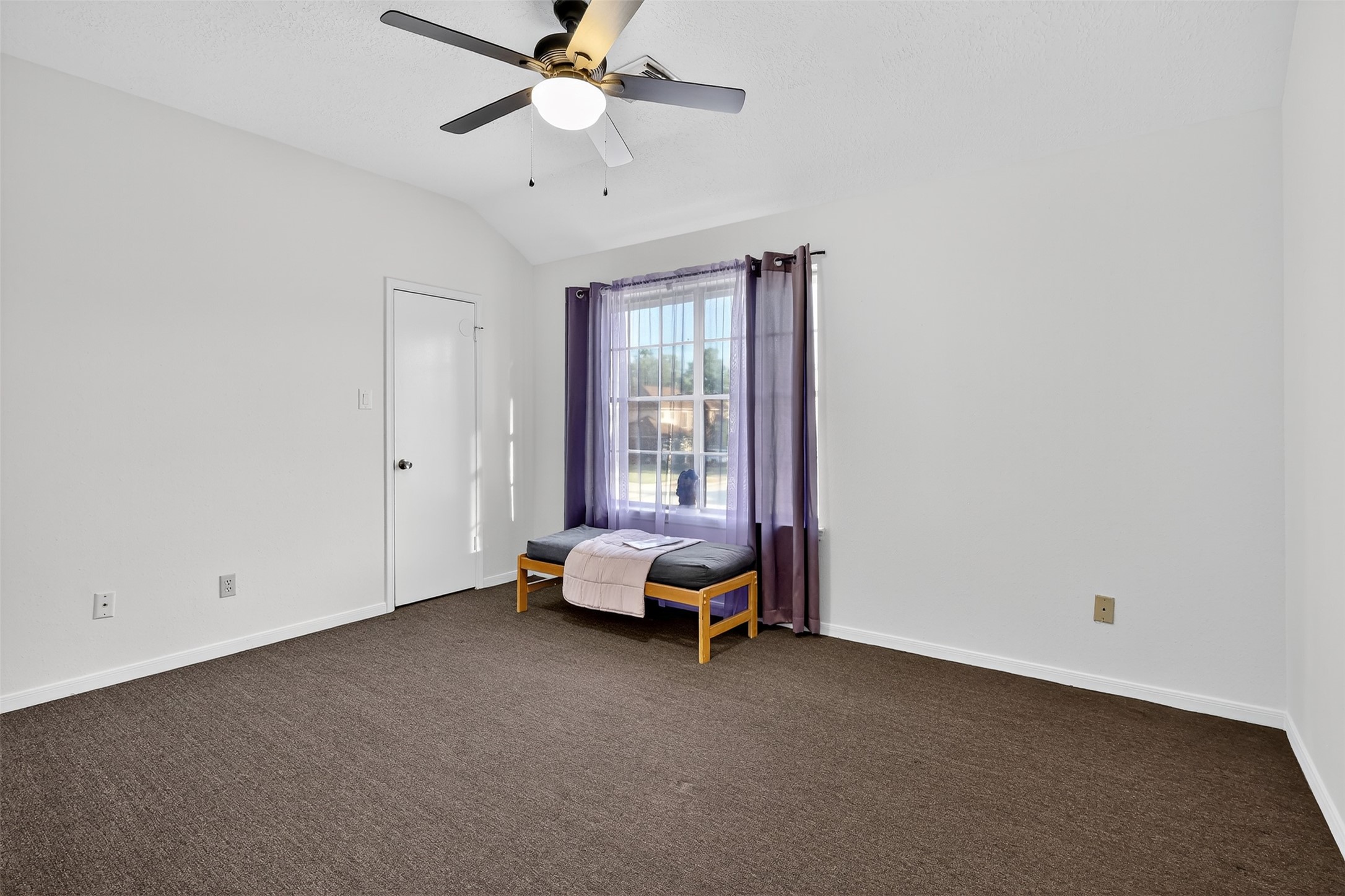 3402 Crystal Dove Drive Spring, TX 77388 - Photo 25 of 33 an empty room with windows and fan