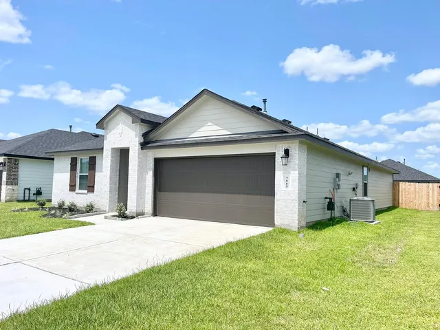 a house with yard in front of it