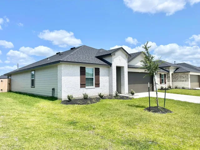 a front view of house with yard and porch