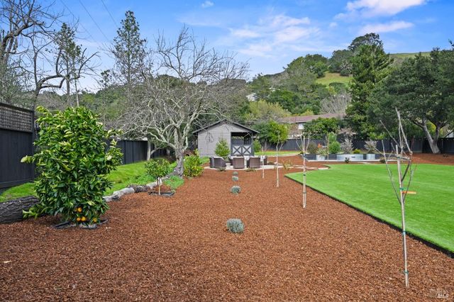 a view of a street with a houses