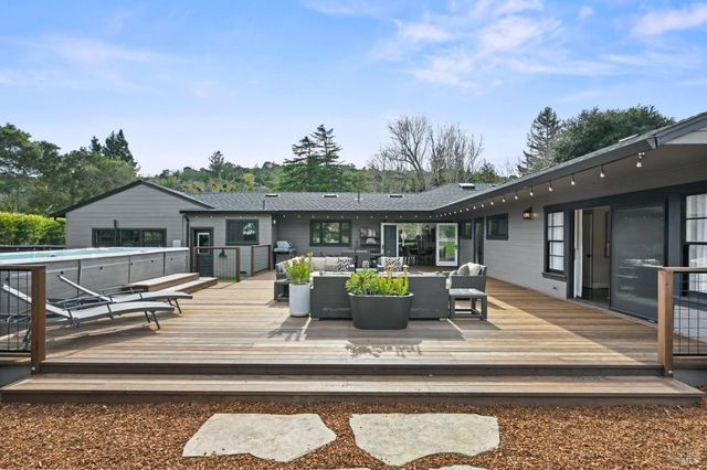 a view of house with patio outdoor seating