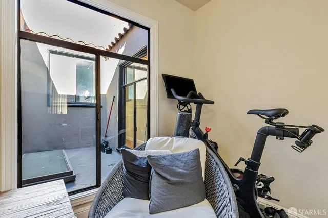 a view of a room with gym equipment