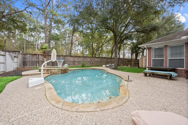 front view of a house with a swimming pool