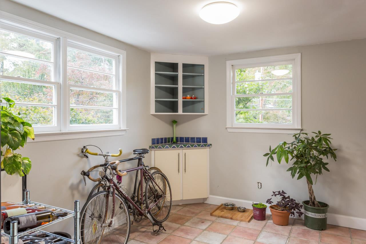 3461 Leonard Street Raleigh, NC 27607 - Photo 17 of 25 Would make great office or studio! Offers lots of natural light and built-in cabinets for storage. Flex/Utility Room off Kitchen