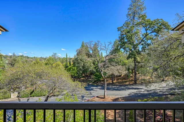 a view of a bench in a backyard