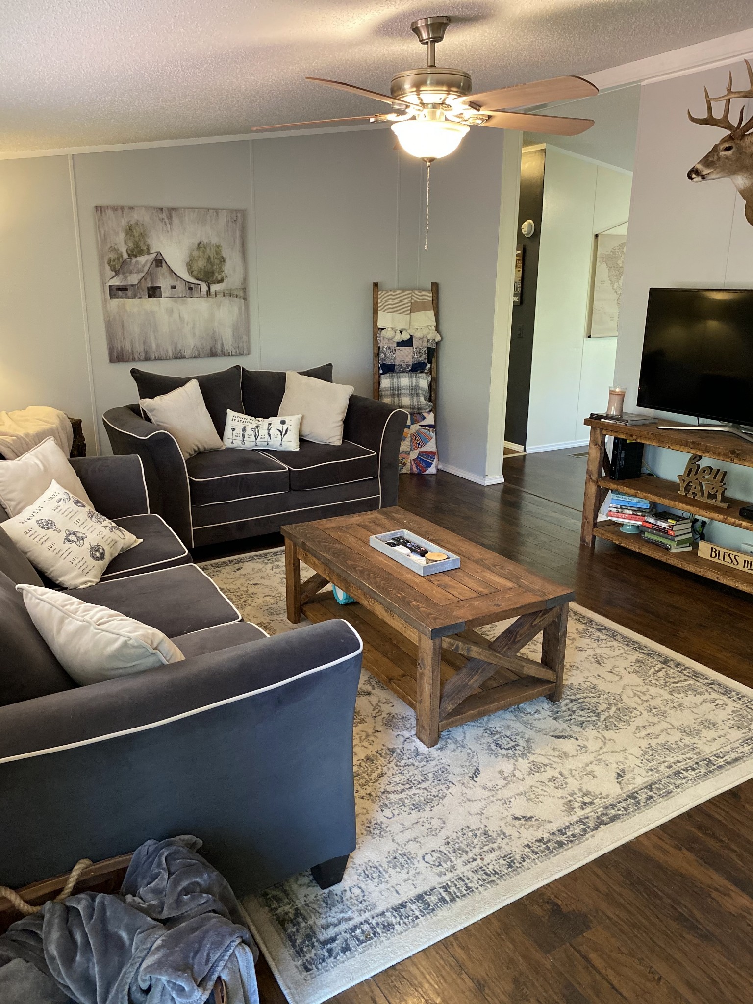 11277 Missionary Ridge Road Bon Aqua, TN 37025 - Photo 14 of 42 a living room with furniture and a flat screen tv