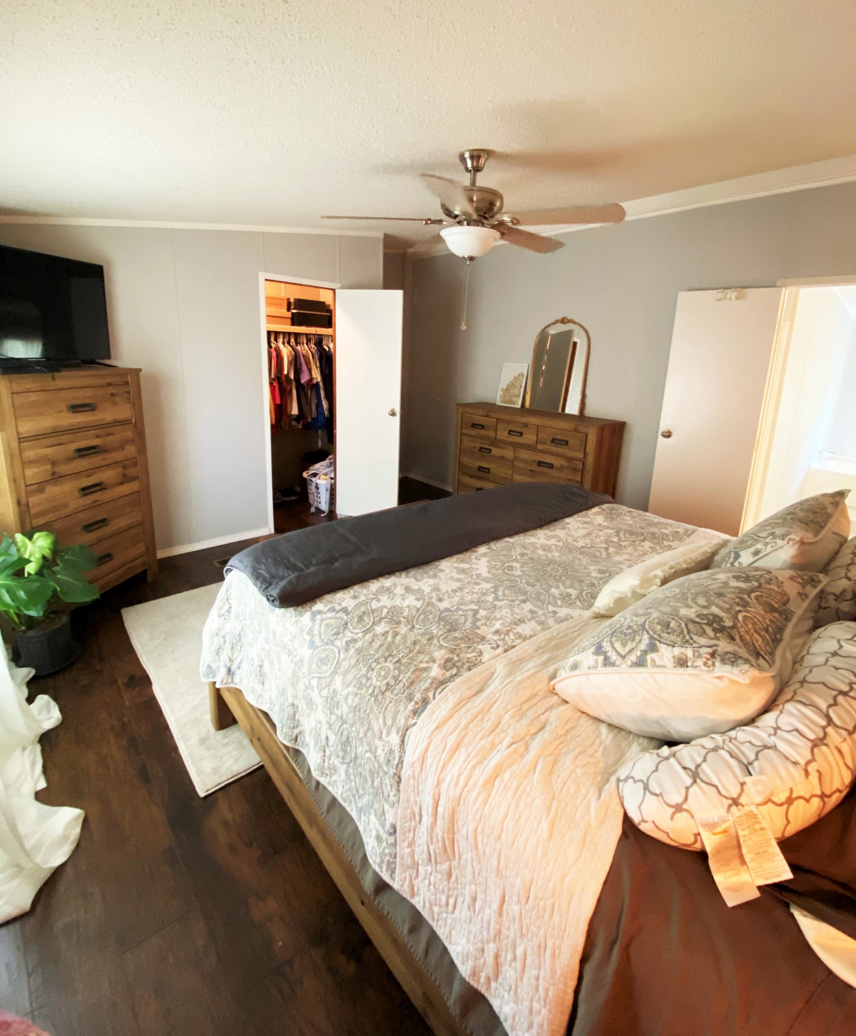 11277 Missionary Ridge Road Bon Aqua, TN 37025 - Photo 6 of 42 a bedroom with a bed and dresser with mirror