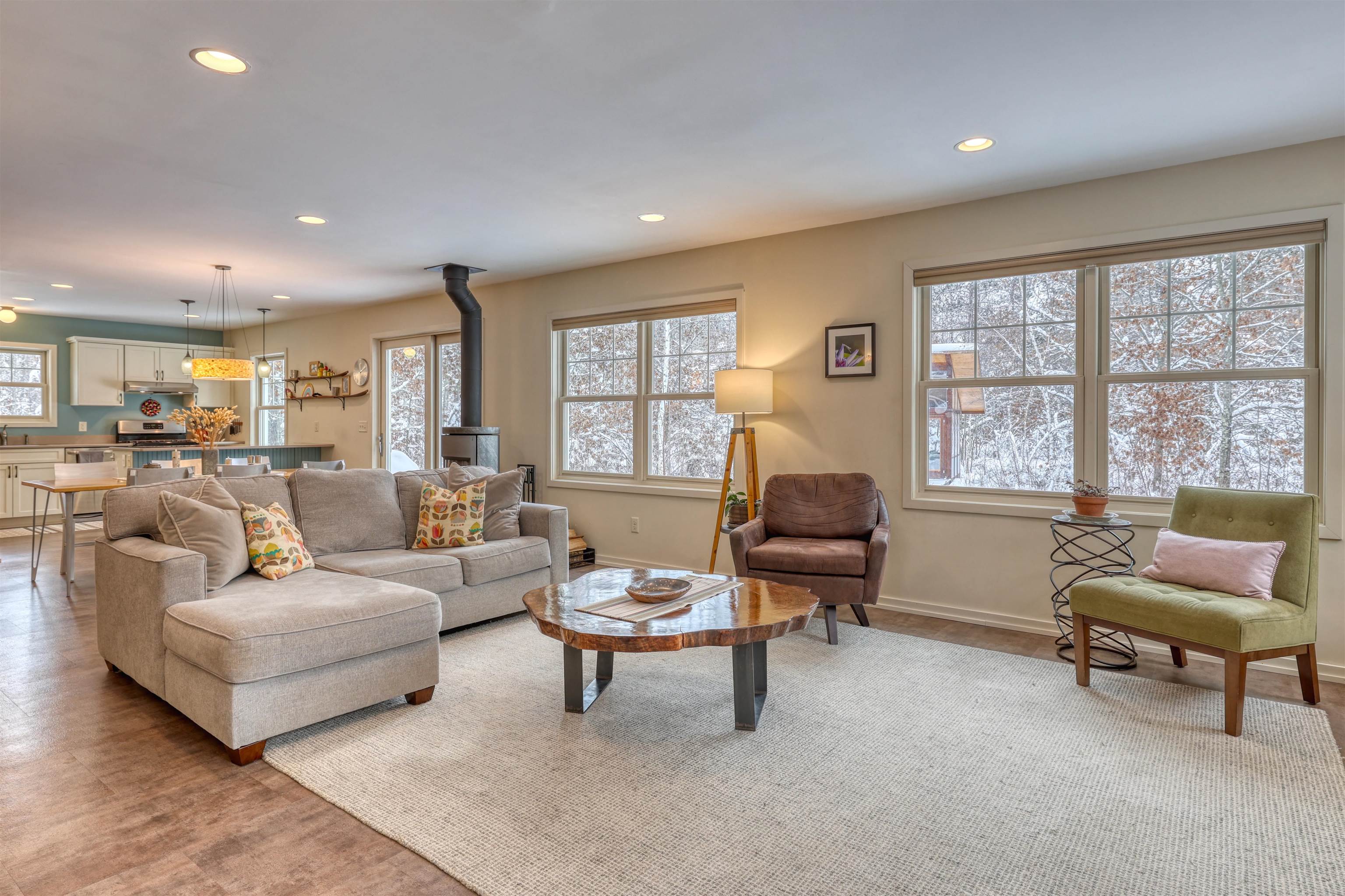 8056 North North Road Springbrook, WI 54875 - Photo 16 of 65 Living area with a wood stove, recessed lighting, and light wood-style flooring