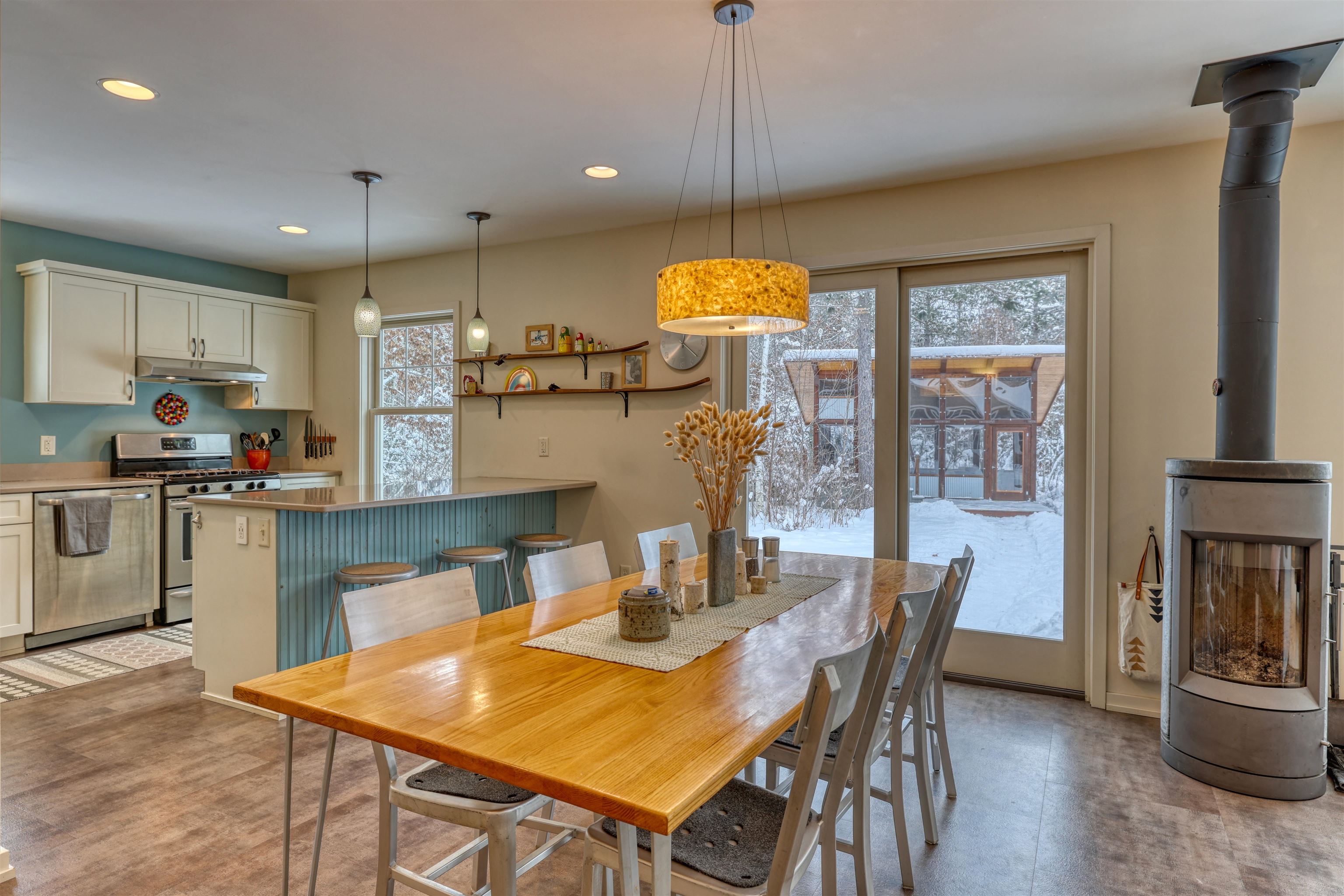 8056 North North Road Springbrook, WI 54875 - Photo 20 of 65 Dining area featuring recessed lighting and a wood stove