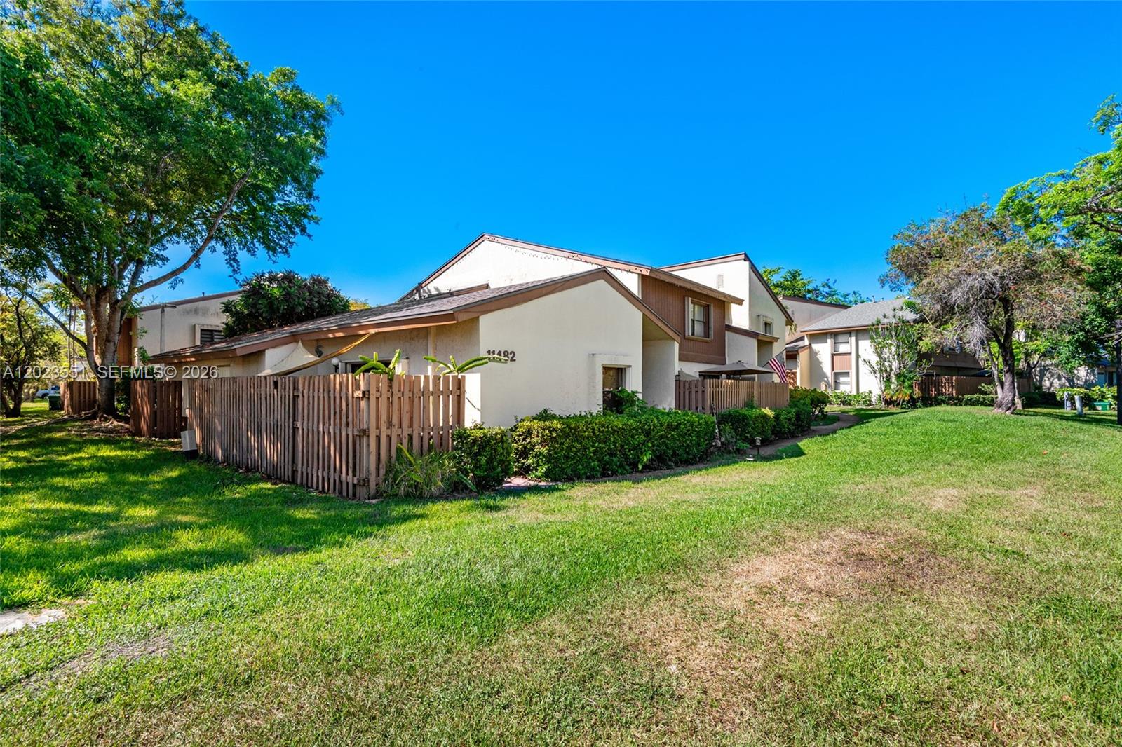 11482 Southwest 109th Road, Unit 29A Miami, FL 33176 - Photo 2 of 28 a view of a house with backyard and garden