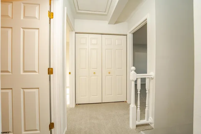 an empty room with a fireplace