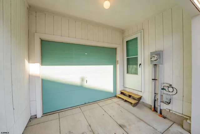 a view of a brick house with a yard