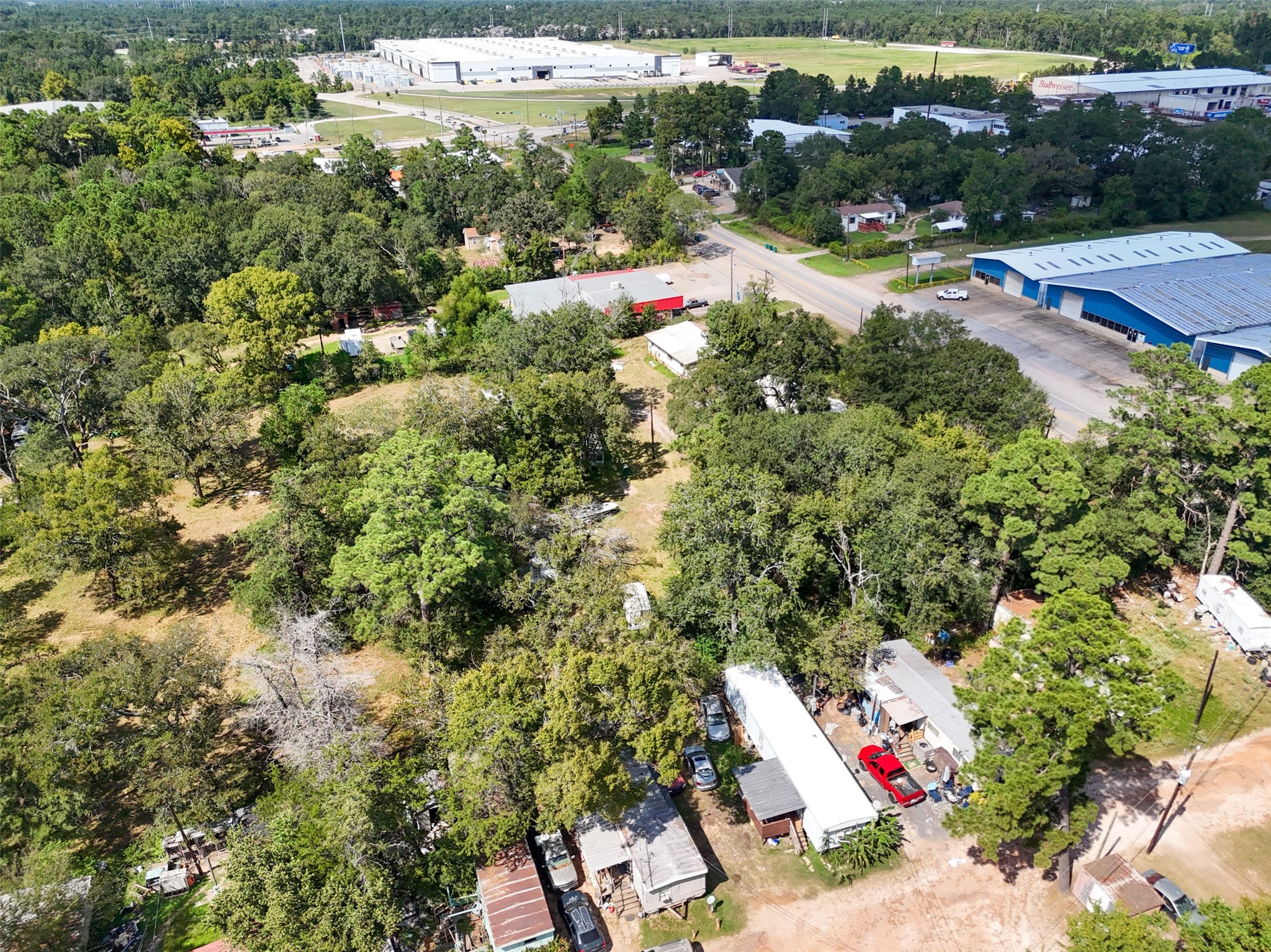 220 Porter Road Conroe, TX 77301 - Photo 5 of 23 an aerial view of residential houses with outdoor space and trees