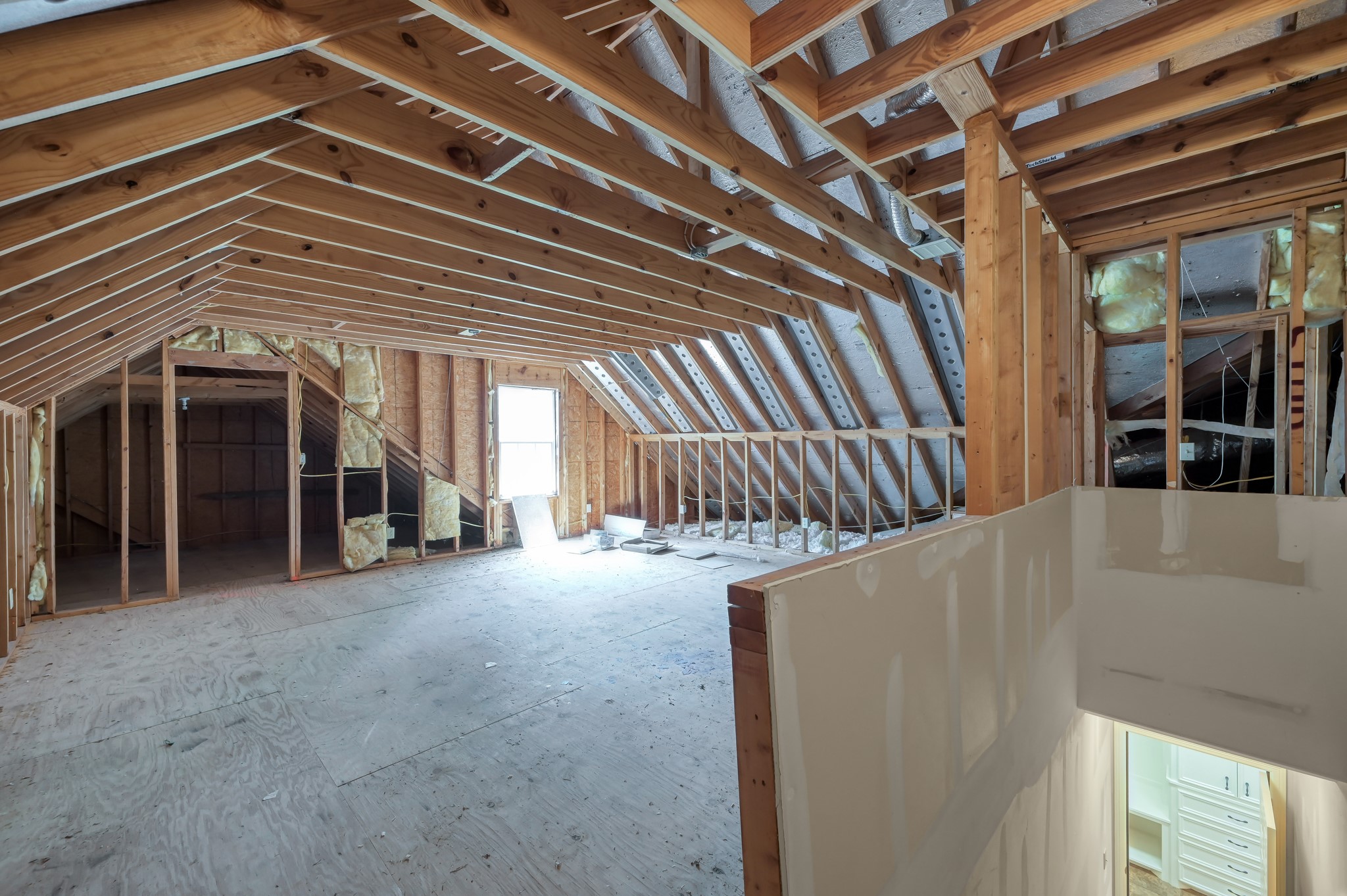 9606 Miller Road Magnolia, TX 77354 - Photo 31 of 41 Oversized attic is ready to be your gameroom or additional living quarters. Plumbed for half bath, wired and ready for HVAC vent placement.