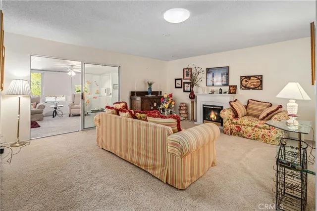 a living room with furniture and a table