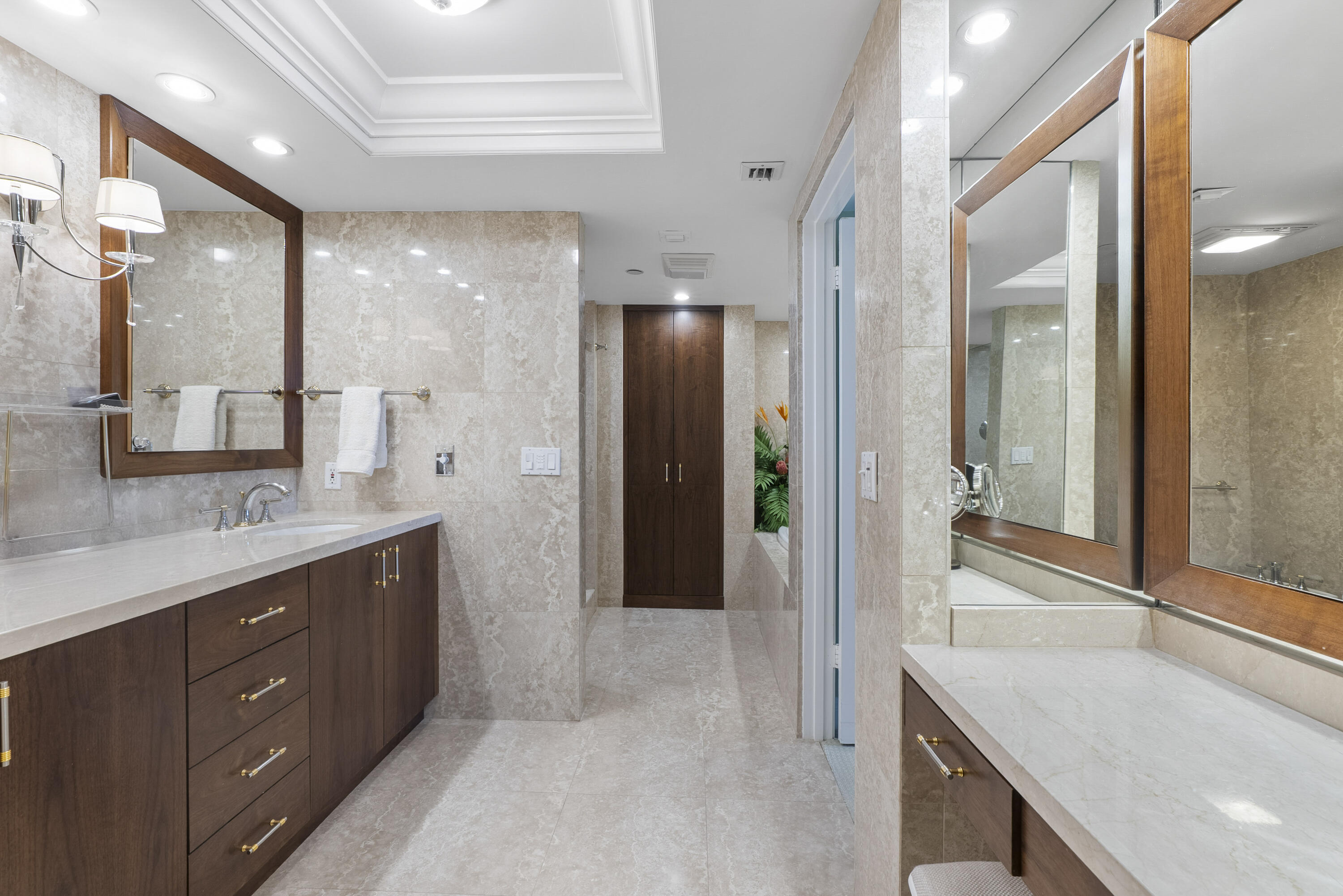 2580 South Ocean Boulevard, Unit 1C3 Palm Beach, FL 33480 - Photo 5 of 17 a bathroom with a sink a toilet and shower