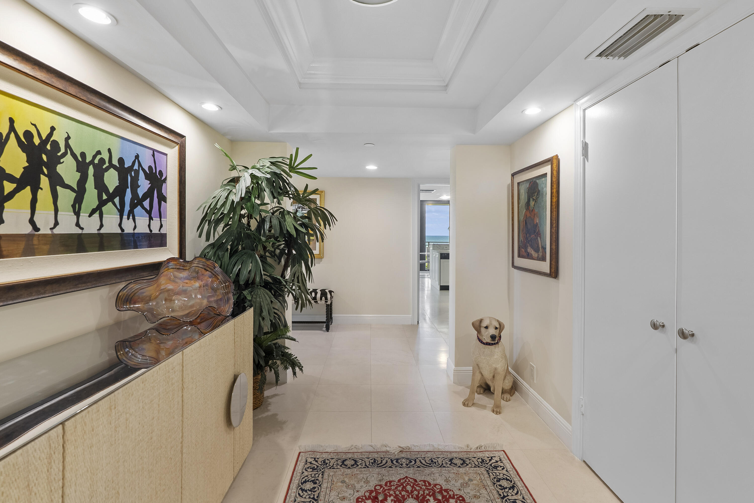 2580 South Ocean Boulevard, Unit 1C3 Palm Beach, FL 33480 - Photo 6 of 17 a living room with furniture and a potted plant
