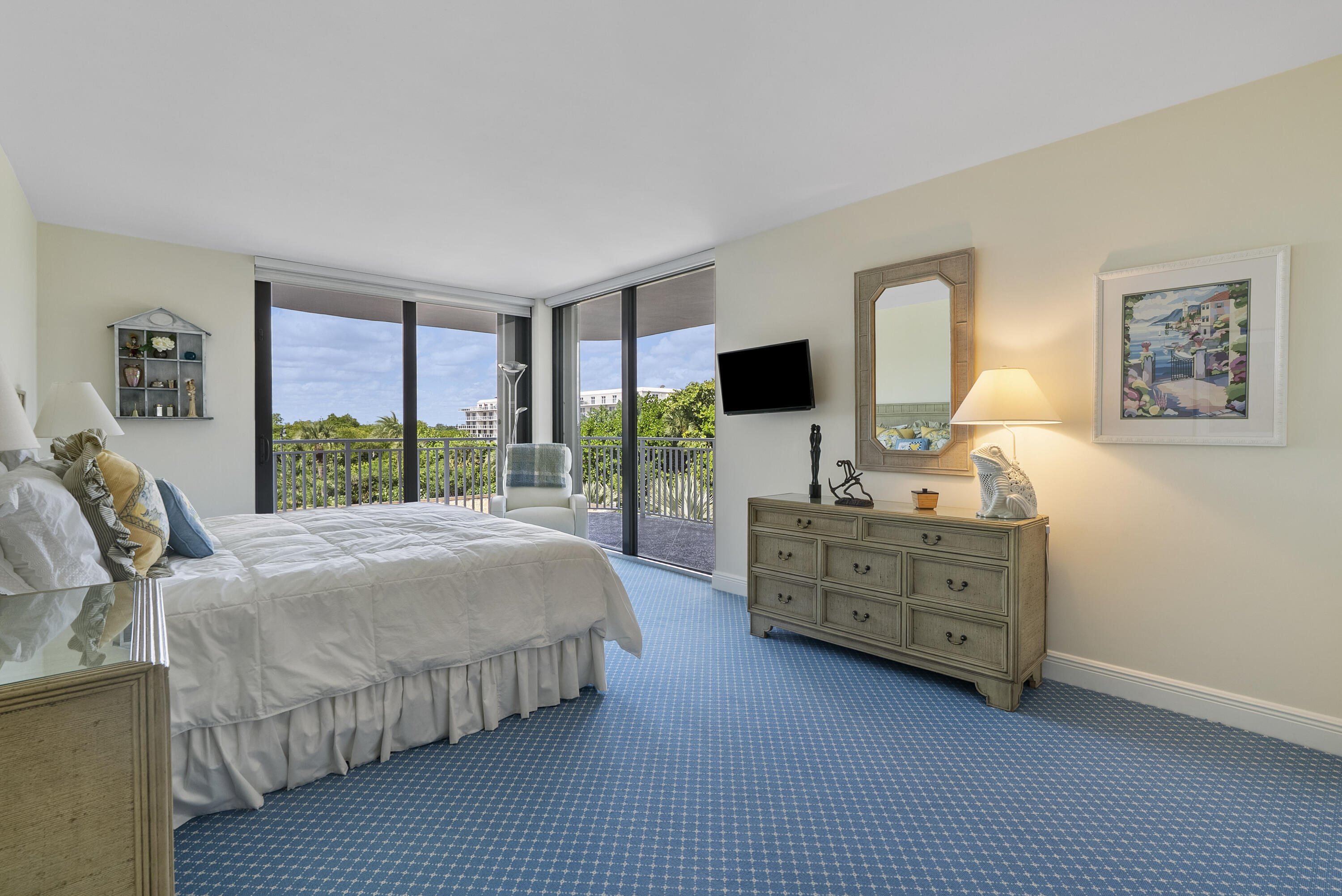 2580 South Ocean Boulevard, Unit 1C3 Palm Beach, FL 33480 - Photo 9 of 17 a bed room with a bed and a television