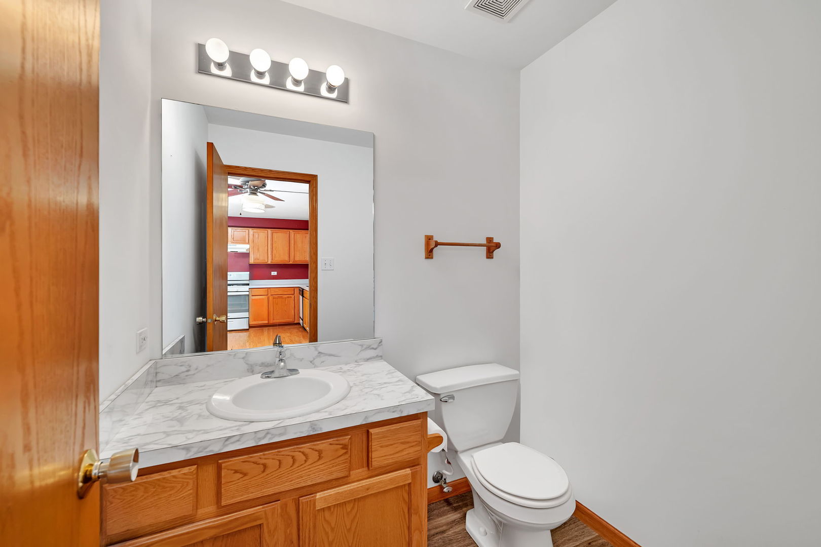 26437 West Deer Path Channahon, IL 60410 - Photo 14 of 26 a bathroom with a granite countertop sink and a mirror