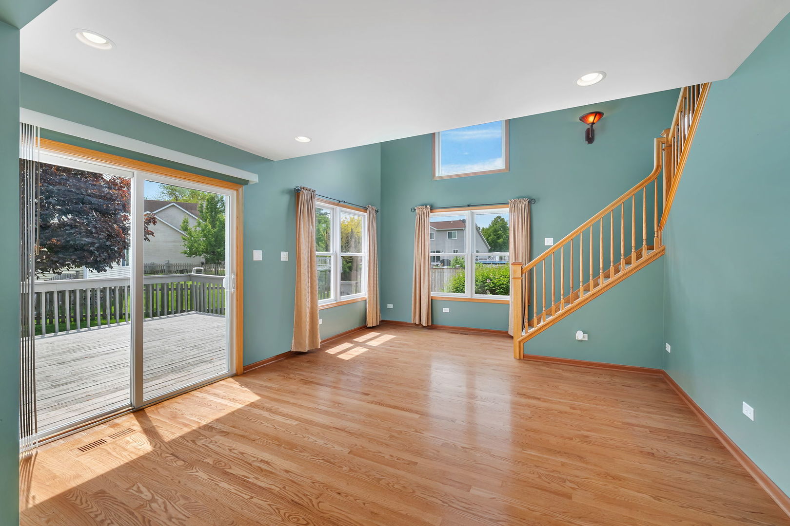 26437 West Deer Path Channahon, IL 60410 - Photo 15 of 26 a view of a livingroom with wooden floor and entrance
