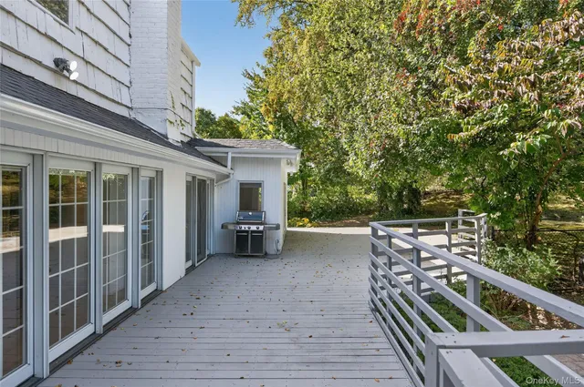a view of a balcony with chairs