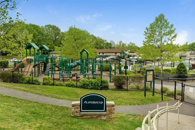 a view of outdoor space with deck and yard