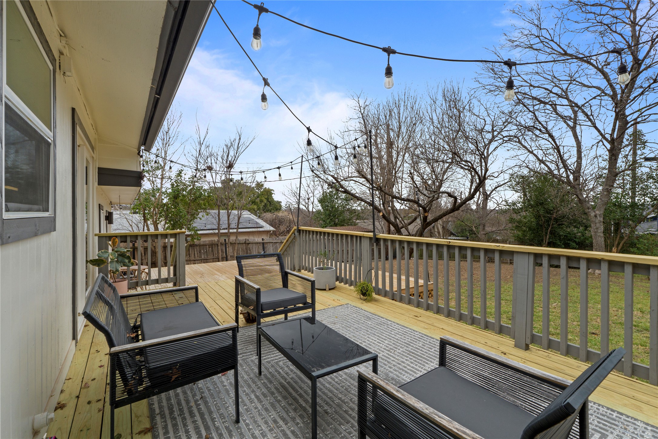 6809 Roanoke Drive Austin, TX 78723 - Photo 21 of 25 Oversized deck featuring an outdoor lounge area