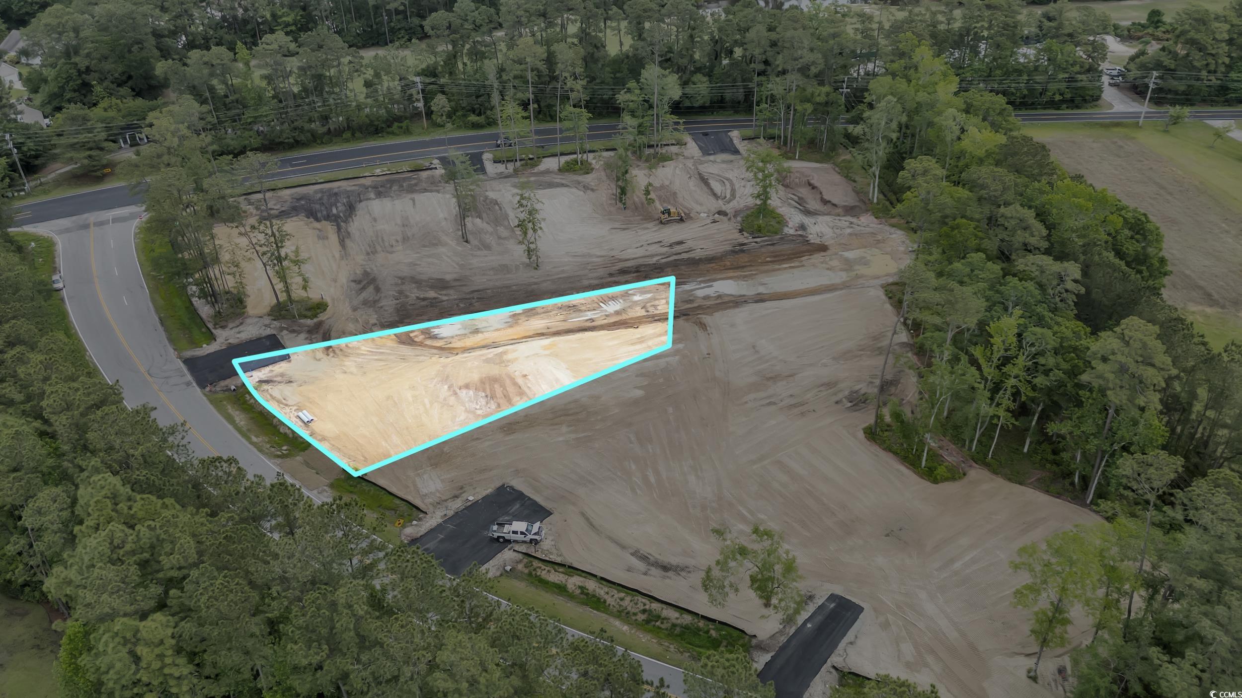1095 Wachesaw Road Murrells Inlet, SC 29576 - Photo 3 of 17 Bird's eye view featuring a forest view