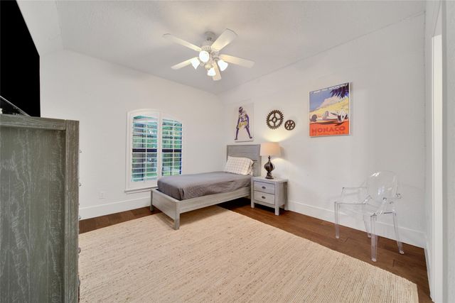 a bathroom with a double vanity sink and mirror