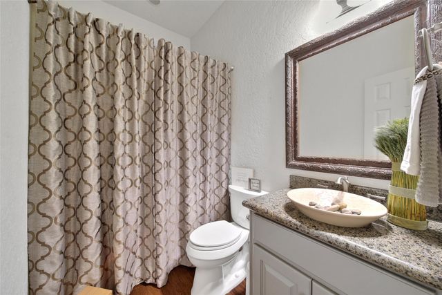 a kitchen that has a sink and a stove