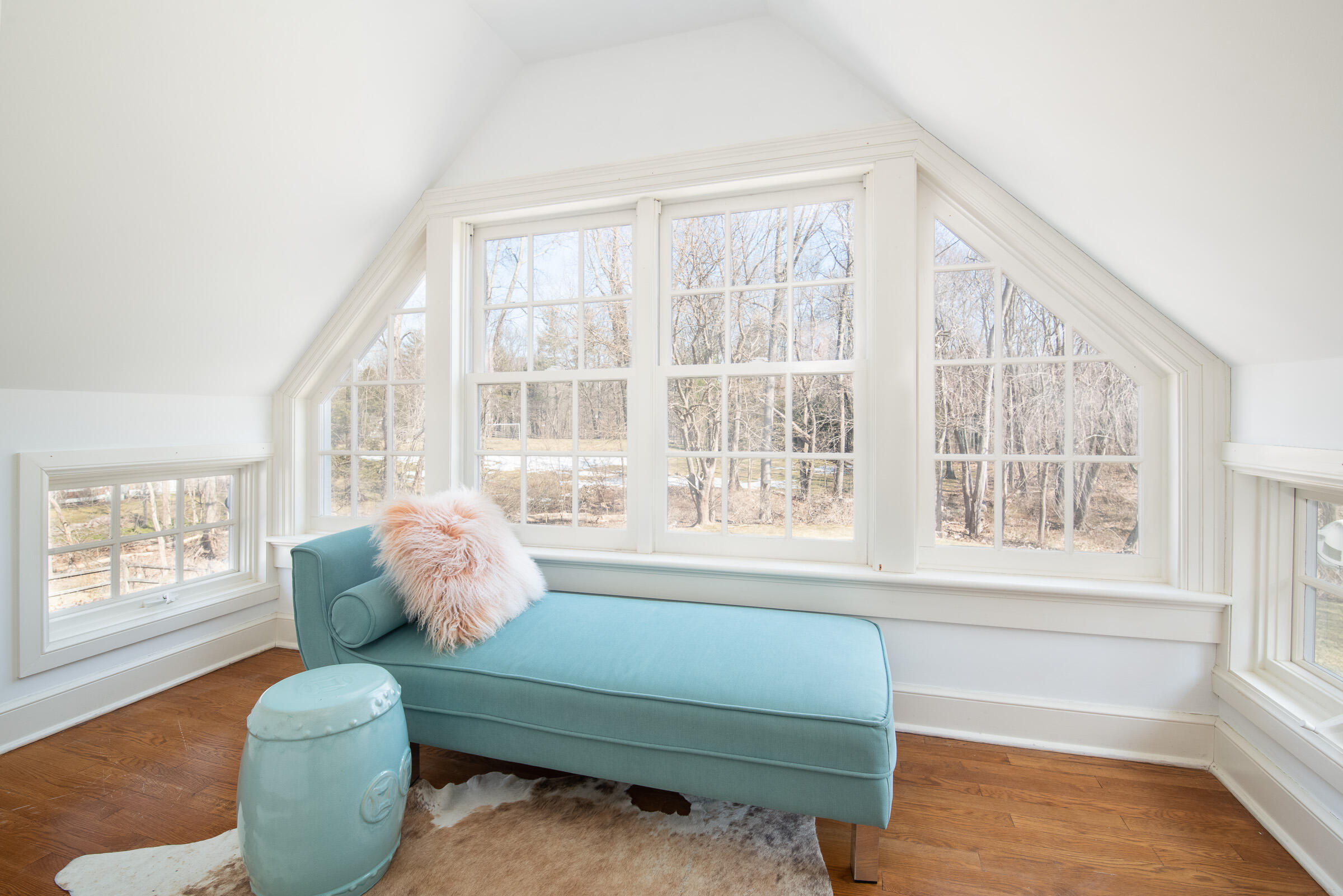 65 Sunset Hill Road New Canaan, CT 06840 - Photo 14 of 21 a living room with furniture and a large window