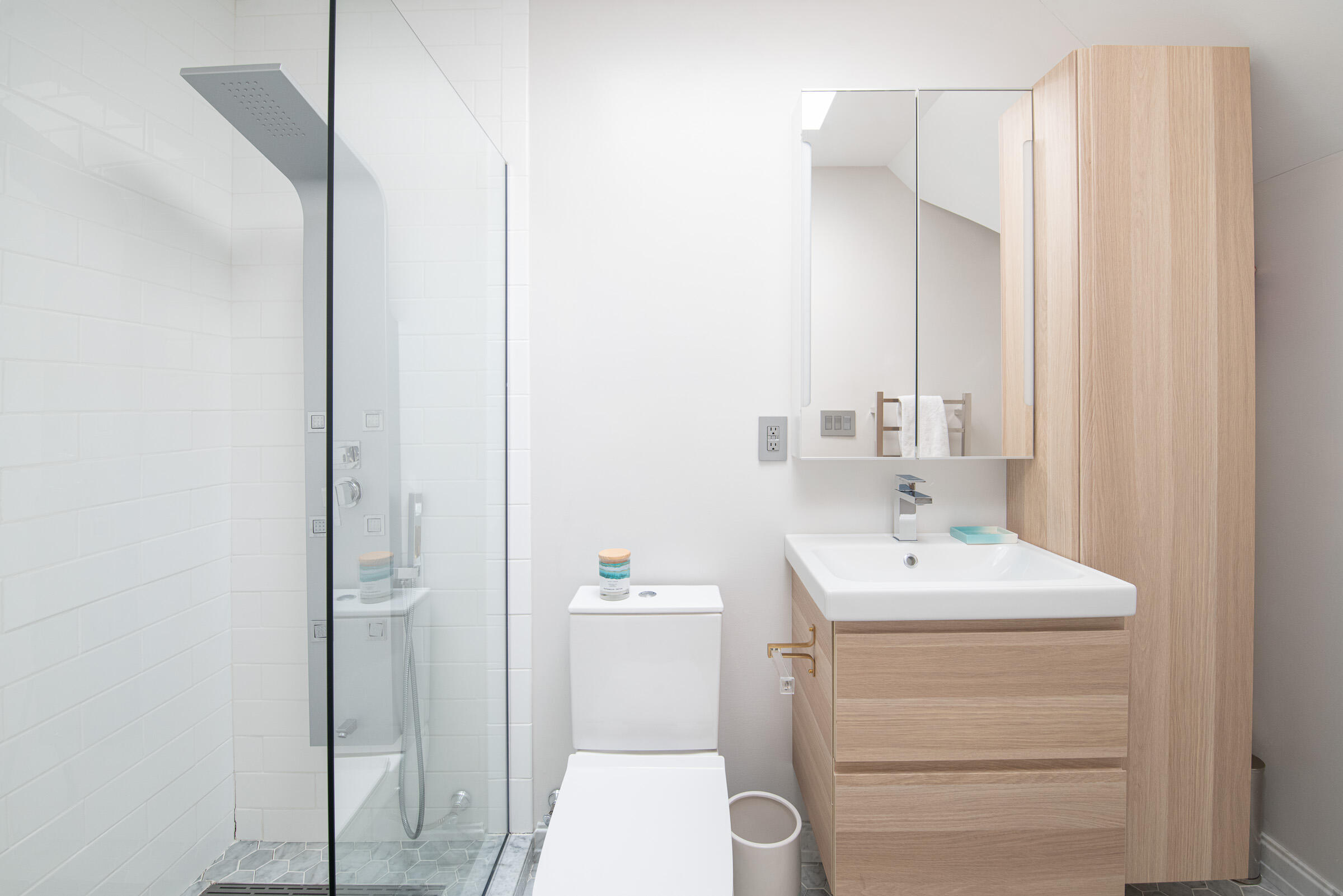 65 Sunset Hill Road New Canaan, CT 06840 - Photo 17 of 21 a bathroom with a sink a toilet and shower