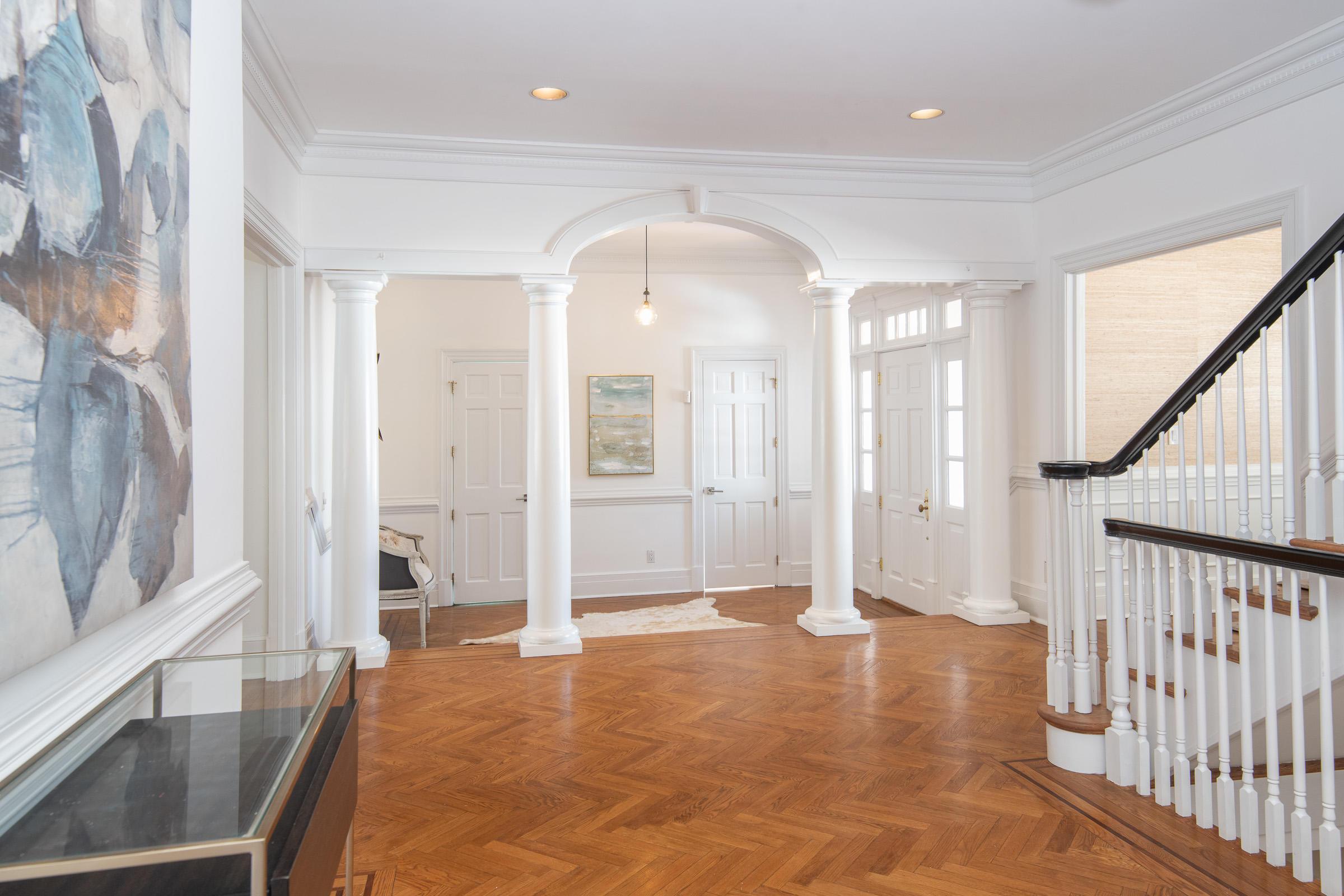 65 Sunset Hill Road New Canaan, CT 06840 - Photo 3 of 21 a view of an entryway with wooden floor