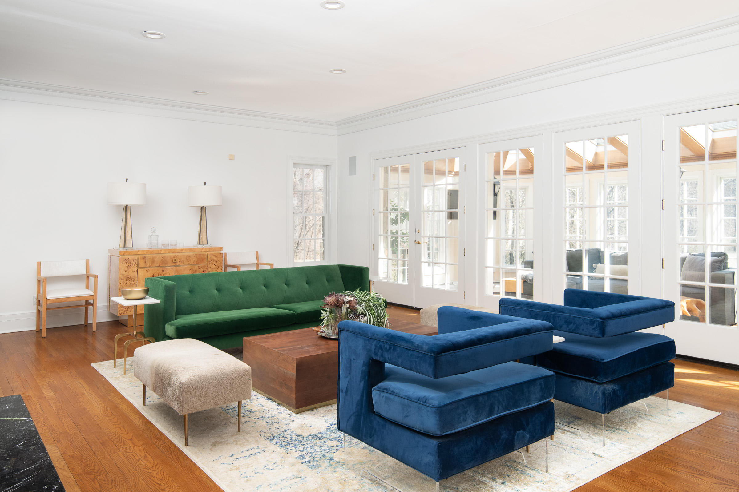 65 Sunset Hill Road New Canaan, CT 06840 - Photo 6 of 21 a living room with furniture and a floor to ceiling window