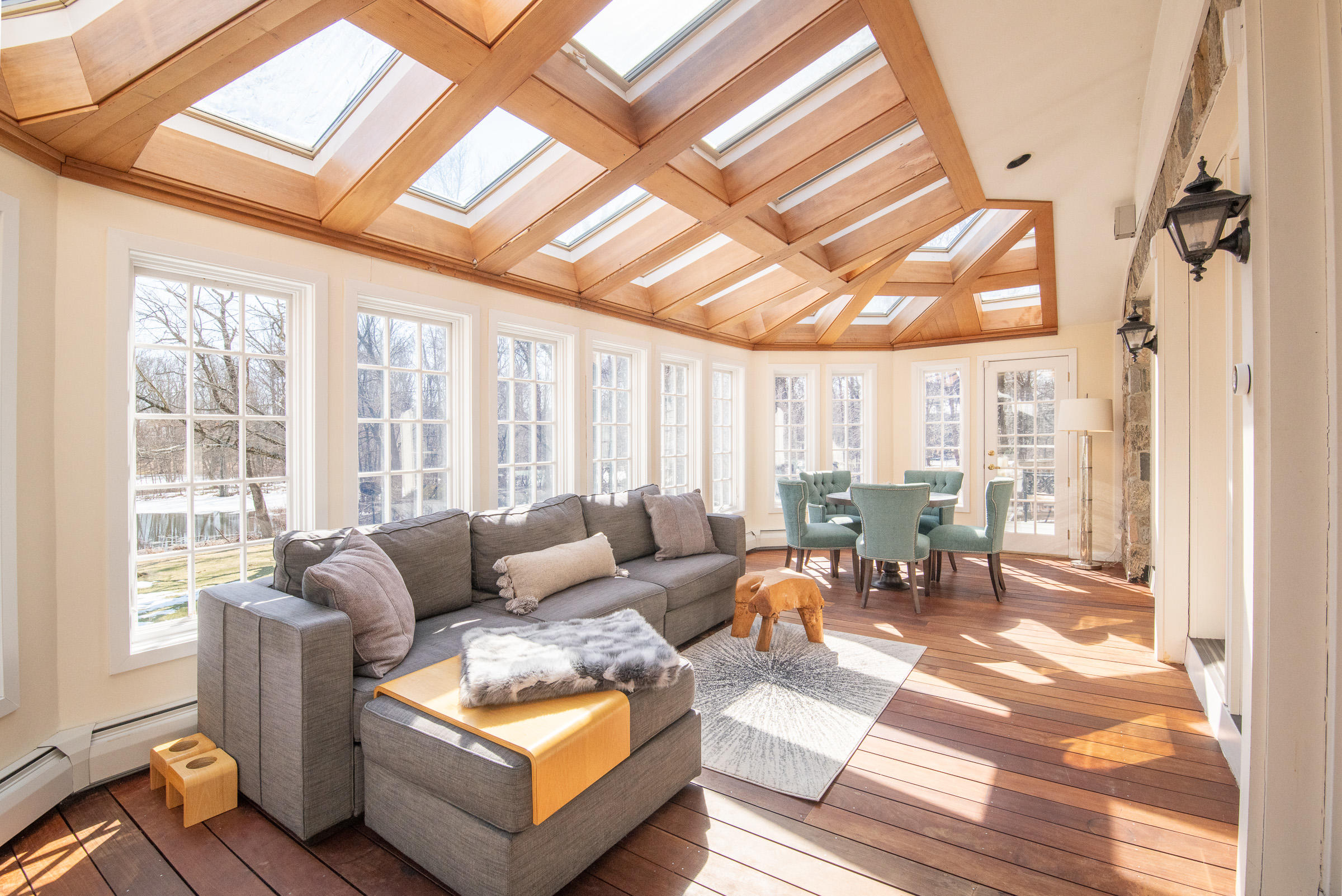 65 Sunset Hill Road New Canaan, CT 06840 - Photo 8 of 21 a living room with furniture and a large window