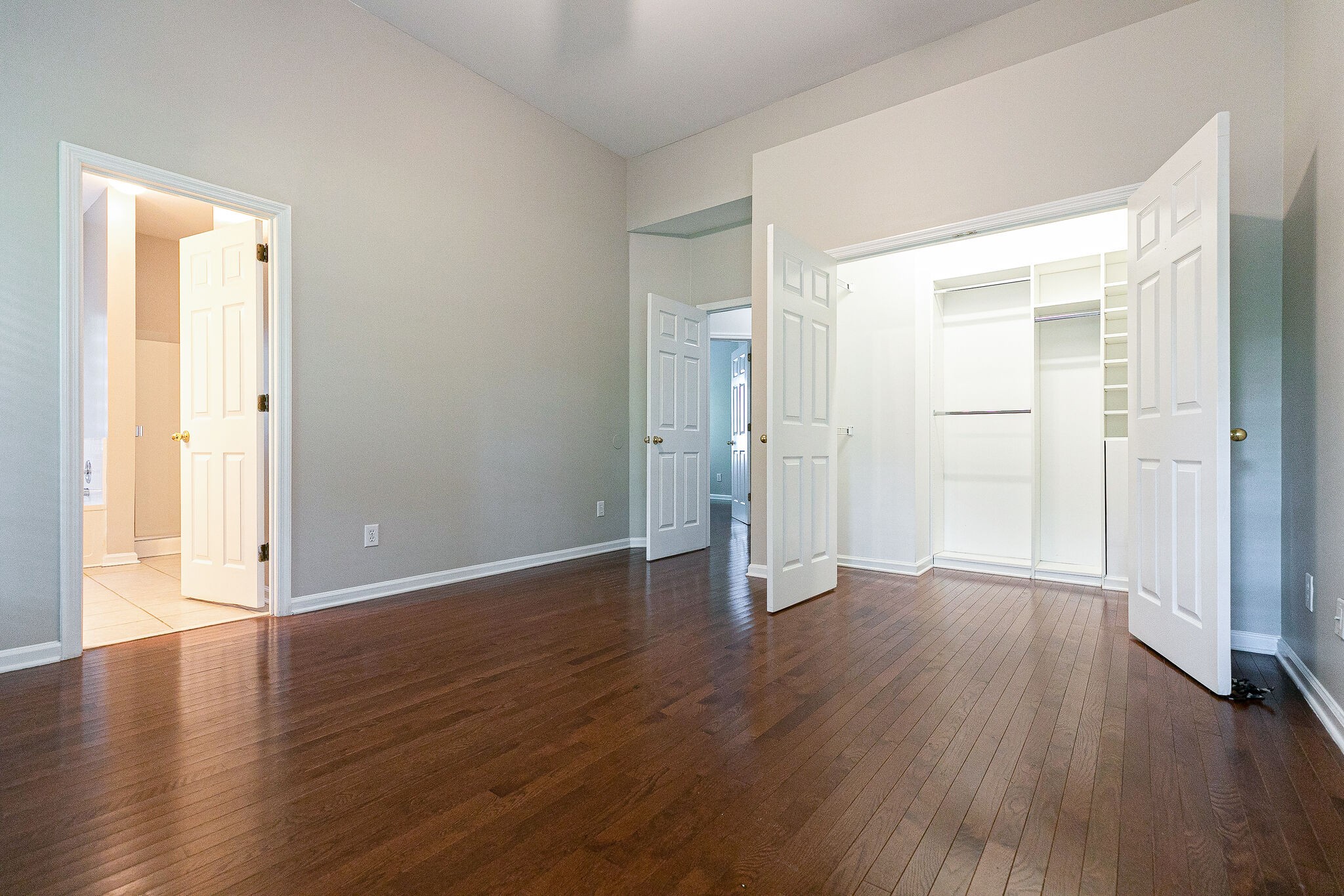 320 Cannonade Circle Franklin, TN 37069 - Photo 17 of 30 an empty room with wooden floor & a glass door