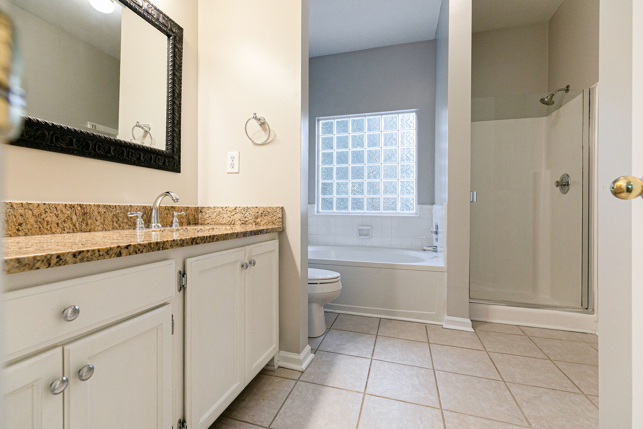 320 Cannonade Circle Franklin, TN 37069 - Photo 18 of 30 a bathroom with a granite countertop sink toilet and shower