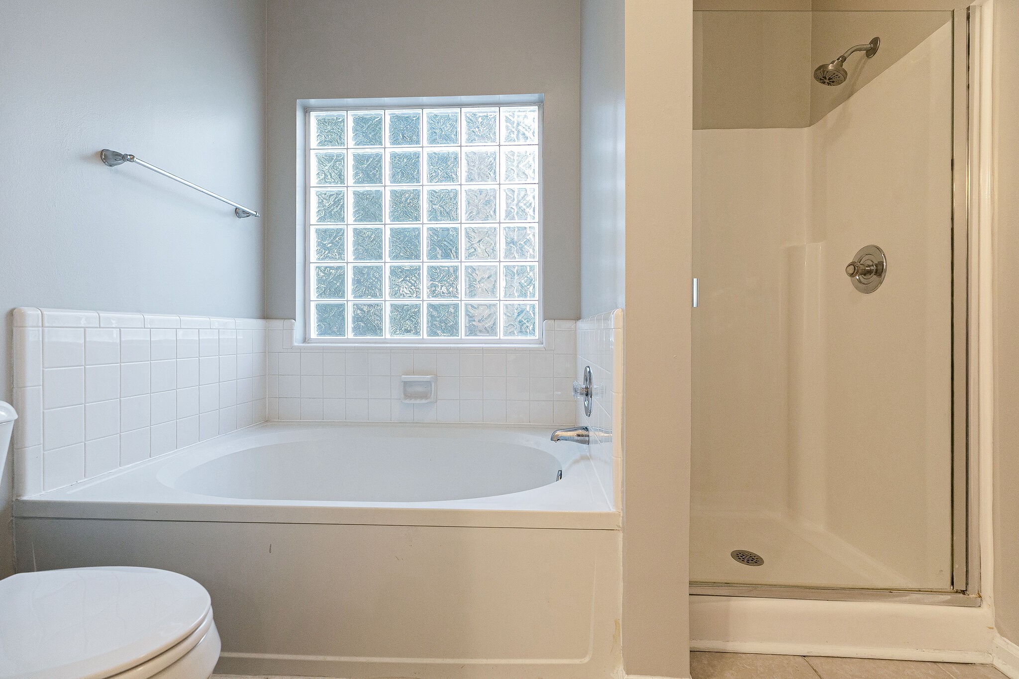 320 Cannonade Circle Franklin, TN 37069 - Photo 19 of 30 a bathroom with a bathtub and a shower