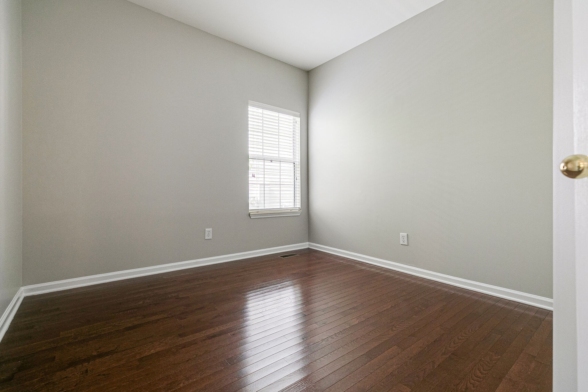 320 Cannonade Circle Franklin, TN 37069 - Photo 20 of 30 an empty room with wooden floor and windows