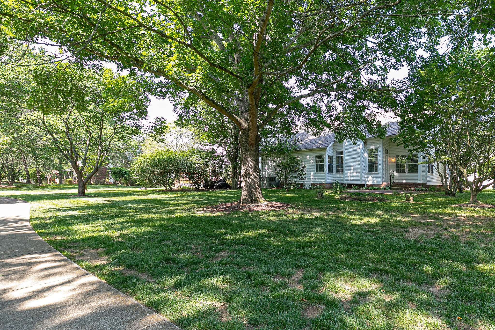 320 Cannonade Circle Franklin, TN 37069 - Photo 29 of 30 a front view of a house with a garden