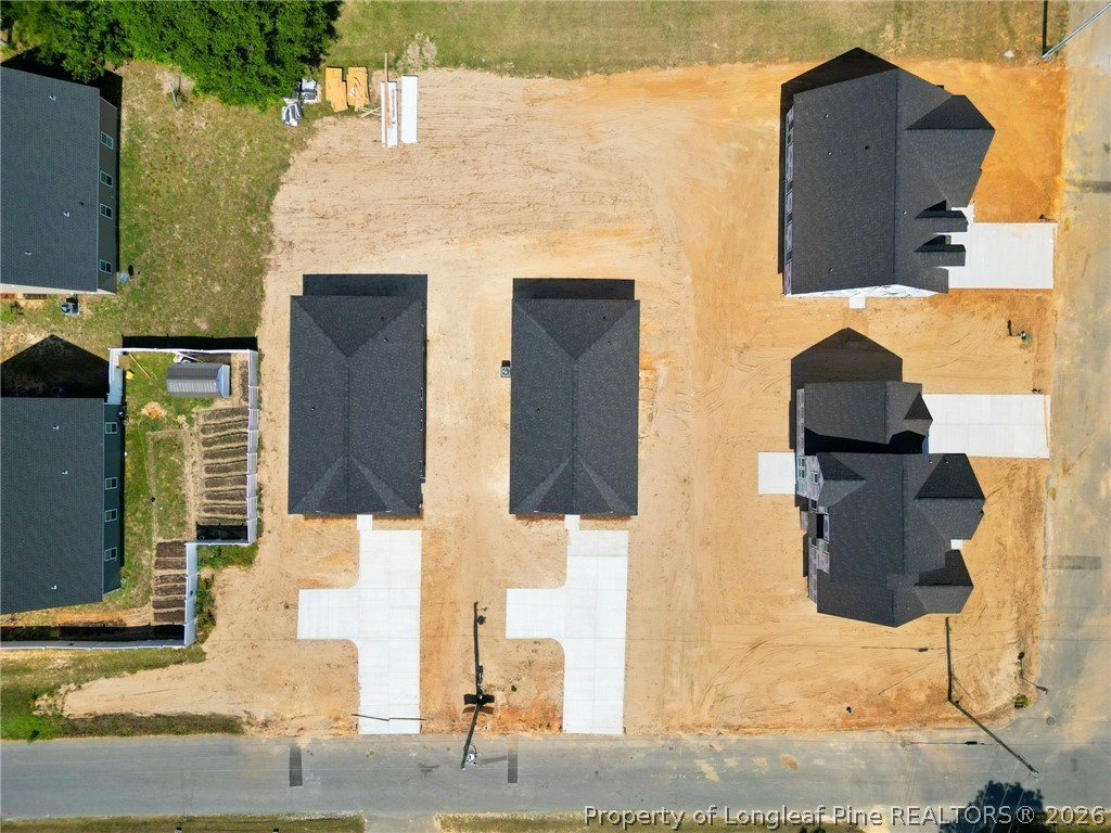 802 Holmes Street Clinton, NC 28328 - Photo 28 of 31 a front view of a house with a yard