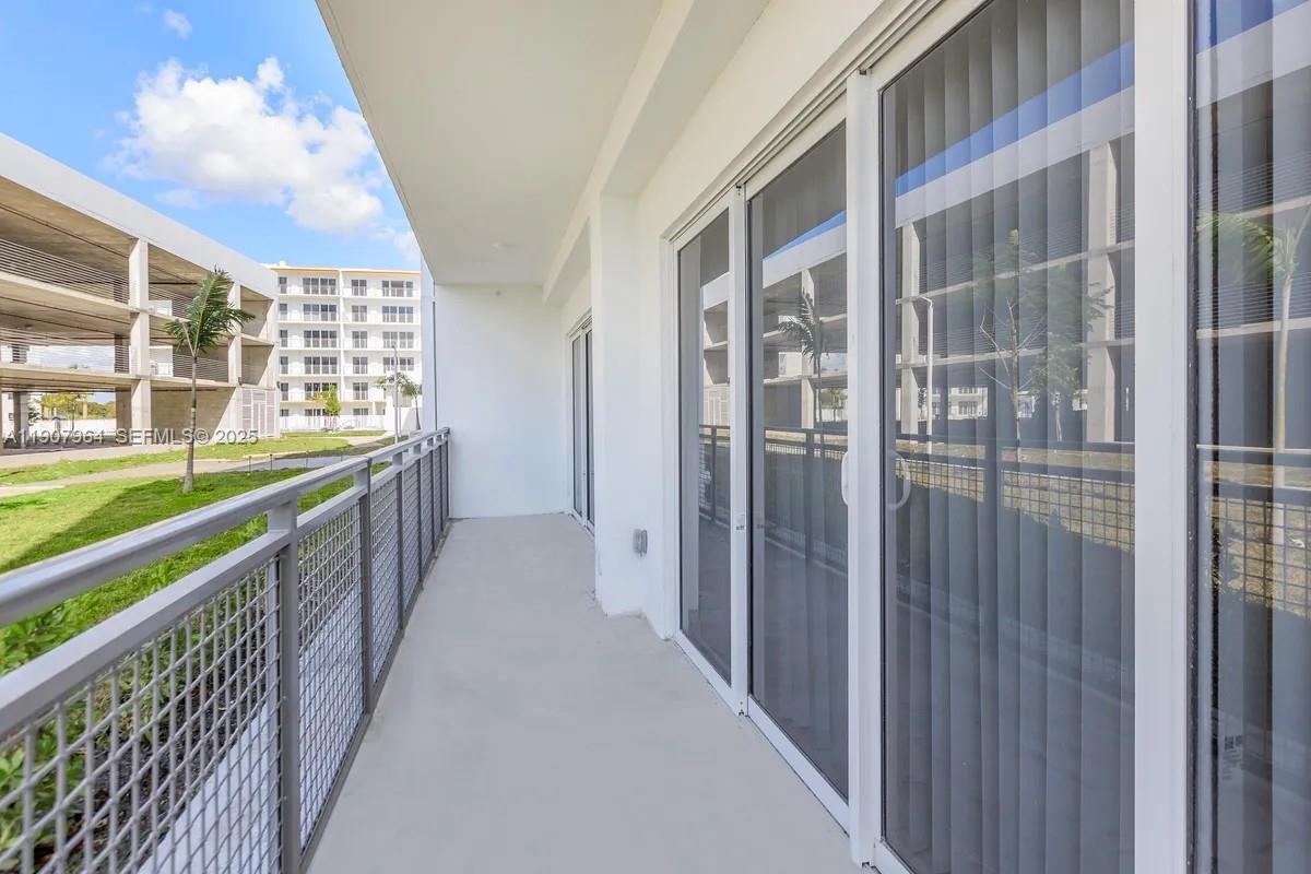 25850 Southwest 140th Court, Unit 6111 Homestead, FL 33032 - Photo 2 of 25 a view of balcony with city view