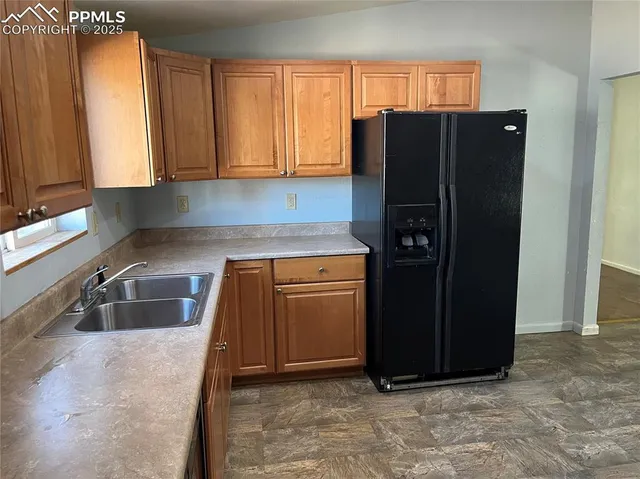 a view of a livingroom with furniture