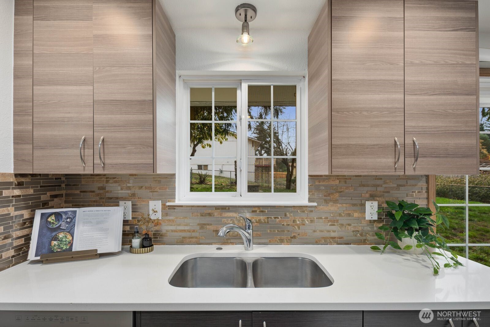 803 Southwest Dash Point Road Federal Way, WA 98023 - Photo 12 of 35 a bathroom with a sink and a bathtub